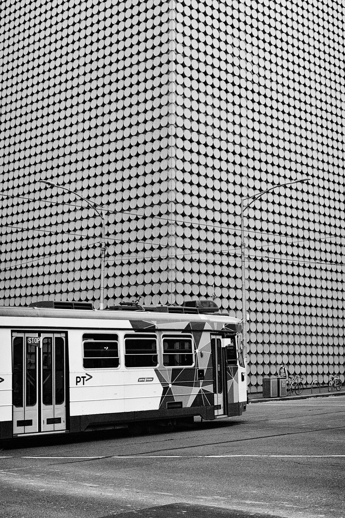 RMIT Design Hub building with a tram in shot